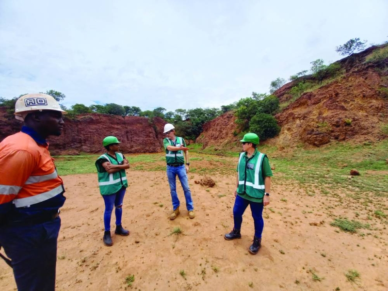 Making plans: Giyani Metals staff and an investor (second from left) meet on site in Otse PIC: JAMES MATHIBE