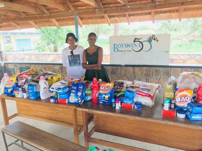 Kerebotswe(dress) donating food hampers at Artesia