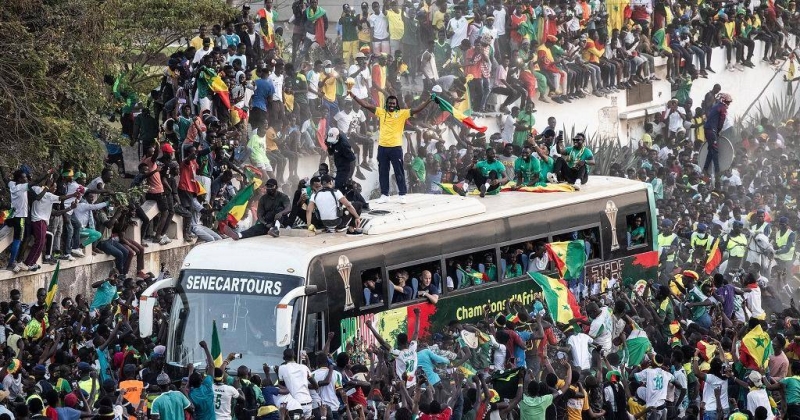 Senegal football team arriving home PIC. AFP
