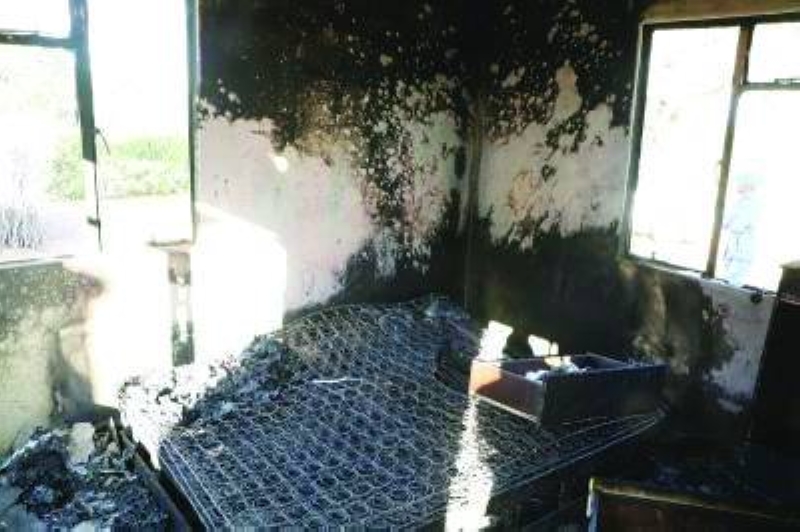 Illustration of a burnt house