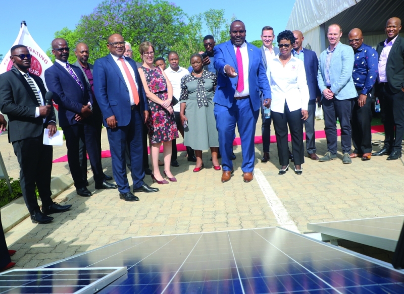 Rays of joy: Education and Skills Development minister, Douglas Letsholathebe and other dignitaries officially launching the solar project on Wednesday PIC: PHATSIMO KAPENG