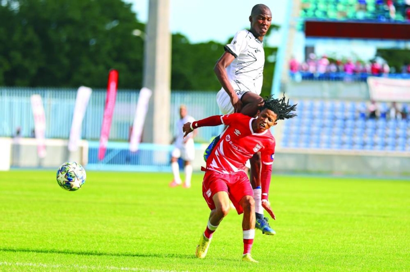 Second half substitute, Mothusi Cooper (in red) gave Gaborone United the much needed creativity in the midfield after he came on PIC: KENNEDY RAMOKONE