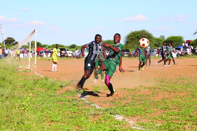 TOUGH BATTLE: Mochudi Centre Chiefs (in black) emerged victorious against Matebejana to keep their promotion dream alive PIC: MORERI SEJAKGOMO