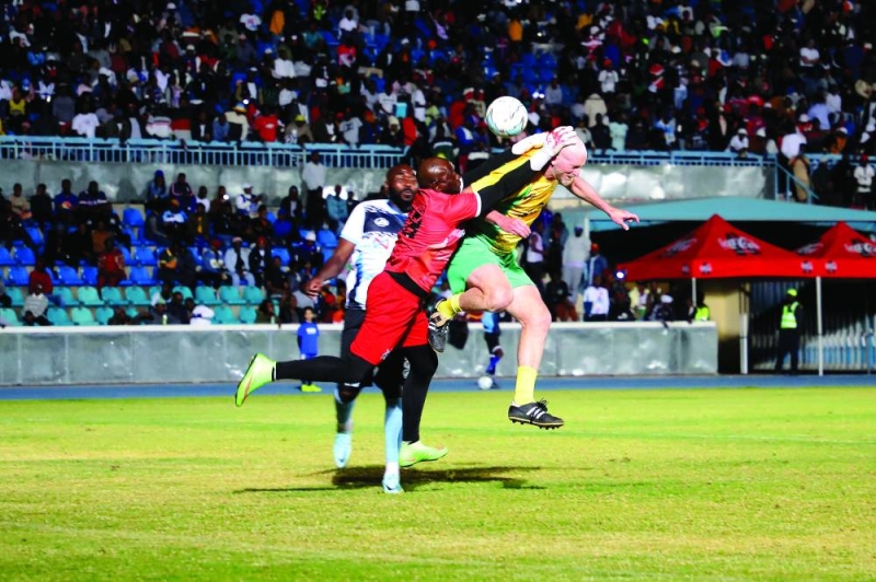 Noah Maposa of Botswana Legends makes a save to deny Matthew Booth (Yellow) of South Africa PIC: KENNEDY RAMOKONE