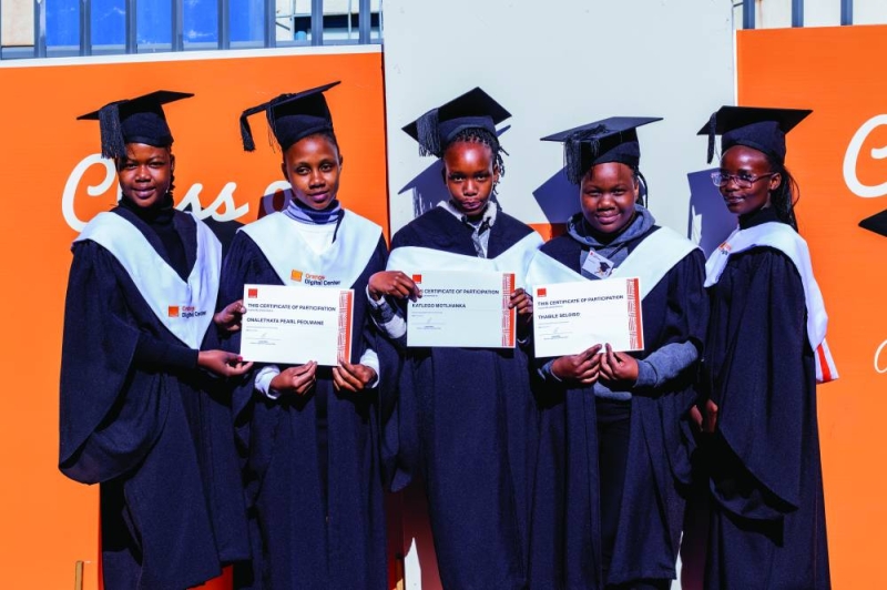 Job done: Part of the 150 students who graduated last week