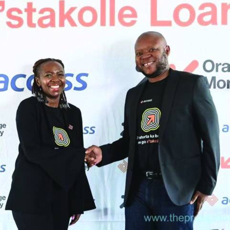 Orange Money CEO Seabelo Modibe (Right)
