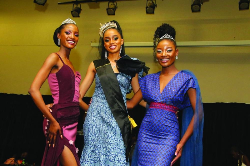 Neolin Jacob (middle) with Olebogeng Oagile and Thabiso Tabithiwa first and second princesses PIC: PHATSIMO KAPENG.