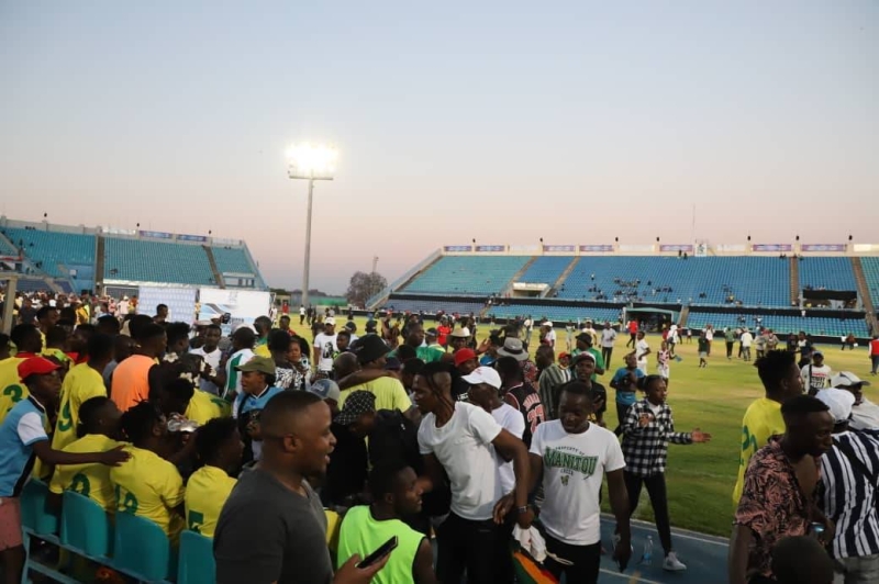 Supporters inside the pitch after the game between Botswana and Zimbabwe.PICS MORERI SEJAKGOMO