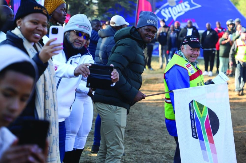 Minister, Tumiso Rakgare (holding flag) has ordered the Botswana Motor Sport (BMS to put its house in order as a matter of urgency PIC: KENNEDY RAMOKONE