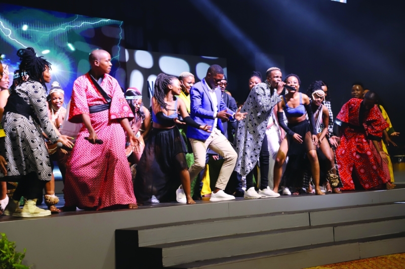 Minister Rakgare dancing with the National Arts Festival 2023 ensemble during the awards ceremonyPIC: KENNEDY RAMOKONE