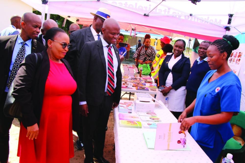 Minister Dikoloti touring stalls in Motokwe during vaccination day PIC: PHATSIMO KAPENG