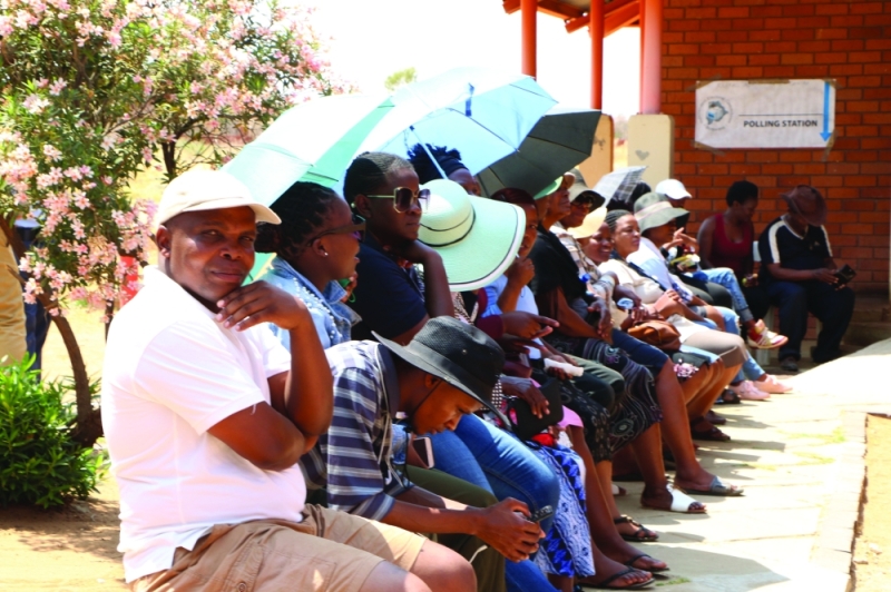Voters lining up at a polling station PIC: MORERI SEJAKGOMO