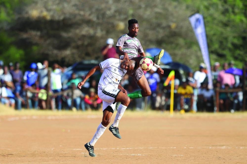 Relegation battle: Ofentse Nato (white) of Gunners fights for the ball against Forest's Kamogelo Mphatlhele (grey and green) PIC: KENNEDY RAMOKONE