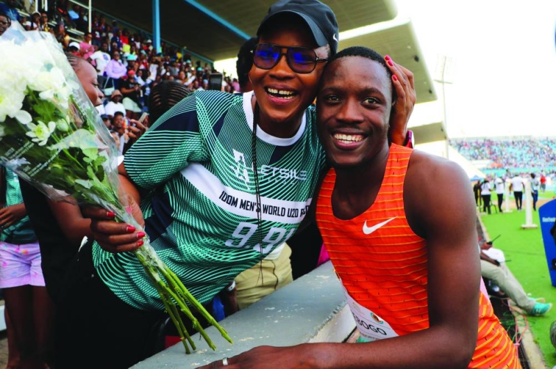 Letsile Tebogo and his mother. PIC PHATSIMO KAPENG
