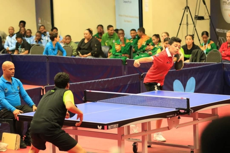 Fierce battle: Egypt (black) and Tunisia fighting it out in the championship match PIC: ITTFA