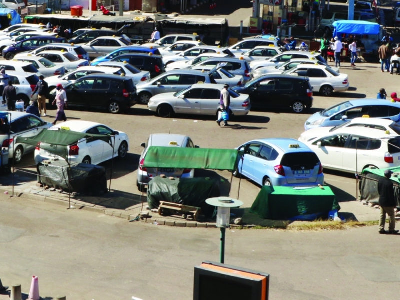 Taxis at bus rank