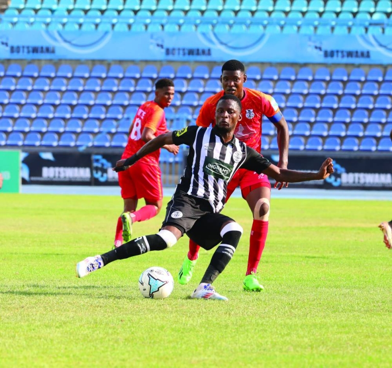 Mochudi Centre Chiefs (in white) remain seated at the summit of the FNB Premiership table PIC: PHATSIMO KAPENG,