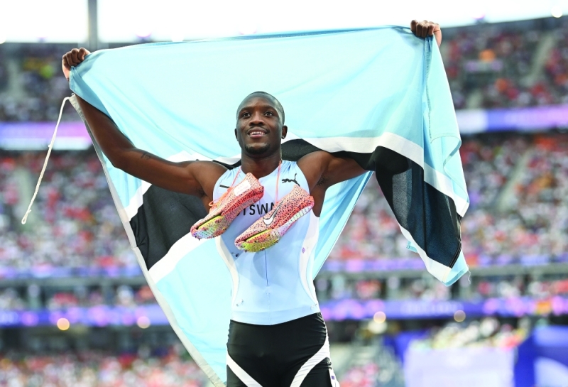 Botswana athlete, Letsile Tebogo, celebrates after winning the Gold medal in Men’s 200m final at the Stade de France during the Paris 2024 Olympic Games Pic: Monirul Bhuiyan/PRESS PHOTO