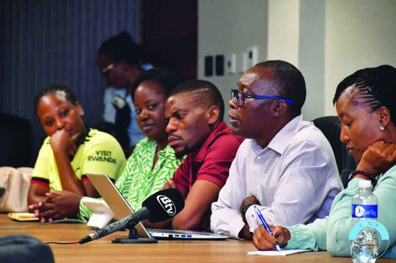 Nkhoma (bespectacled) leading media colleagues in a presentation at the Office of the President
