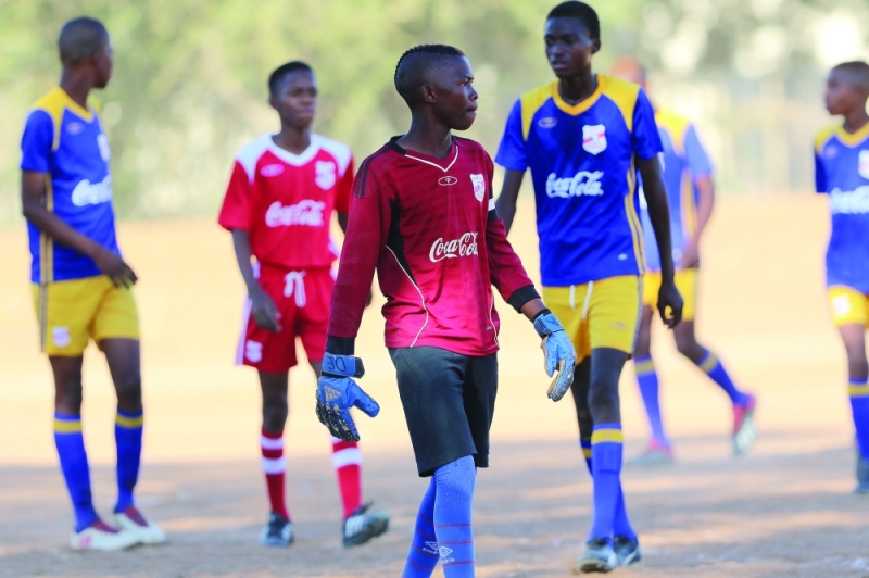 Learners during a Copa Coca-Cola football match FILE PIC