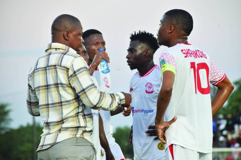 Elias Chinyemba (left) giving instructions to his players during their match against Gaborone United on Friday. PIC PHATSIMO KAPENG