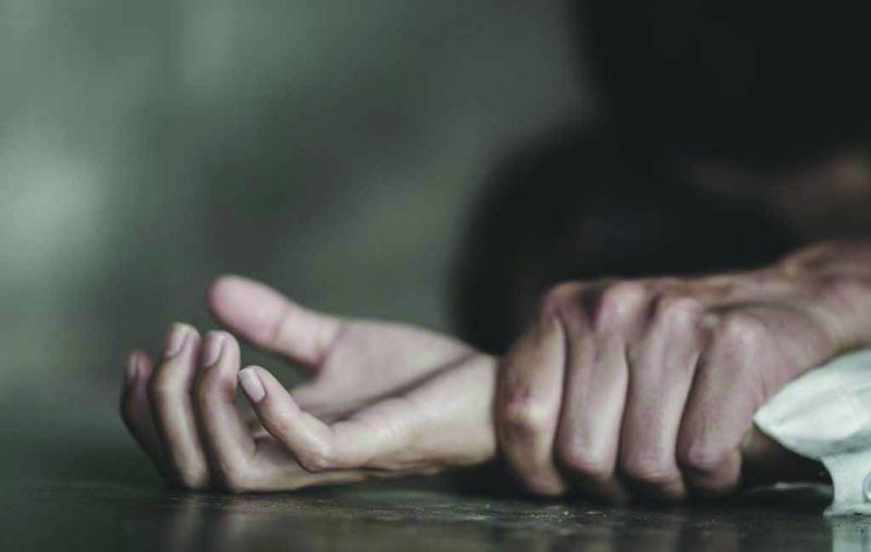 Rape and abuse: Close up of a perpetrator's hands pinning down the victim.