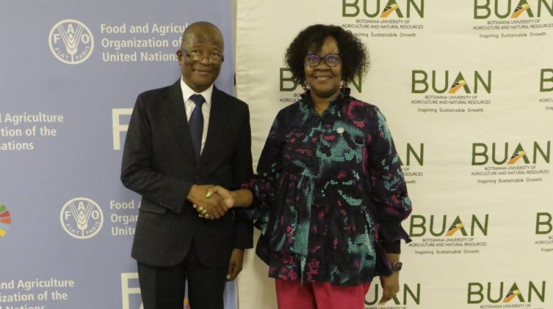 Prof Ketlhatlhogile Mosepele Vice Chancellor BUAN (left) and Carla Mucavi FAO representative Botswana (right) all smiles at the signing ceremony of the MoU