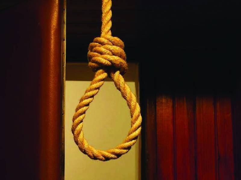 Suspect commits suicide