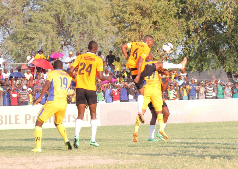 Not reaching expected heights: Thabang Mosige (airborne) of Orapa United and Joel Mogorosi (Rollers) challenge for a high ball during their clash on Sunday. PIC: KEOAGILE BONANG