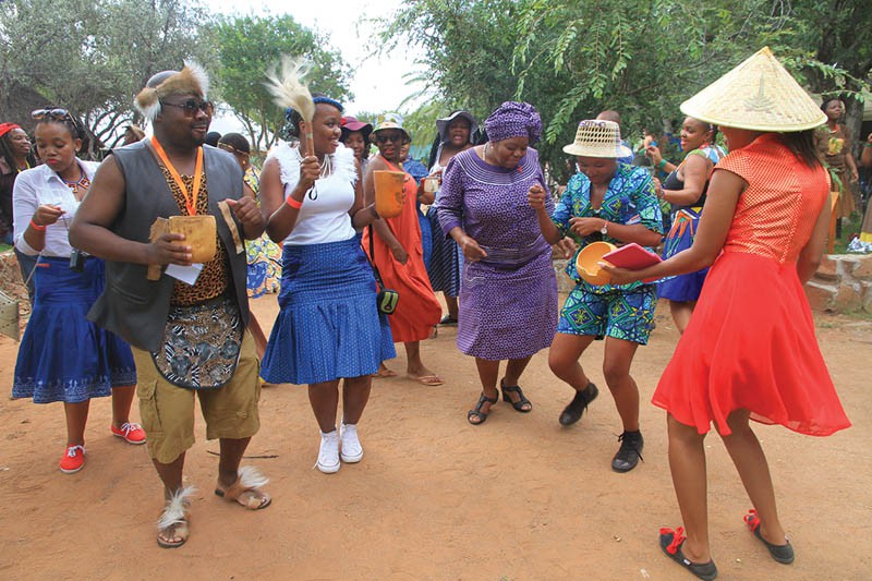 Sheila Tlou leading women to welcome bojalwa ja setswana at Son of the Soil