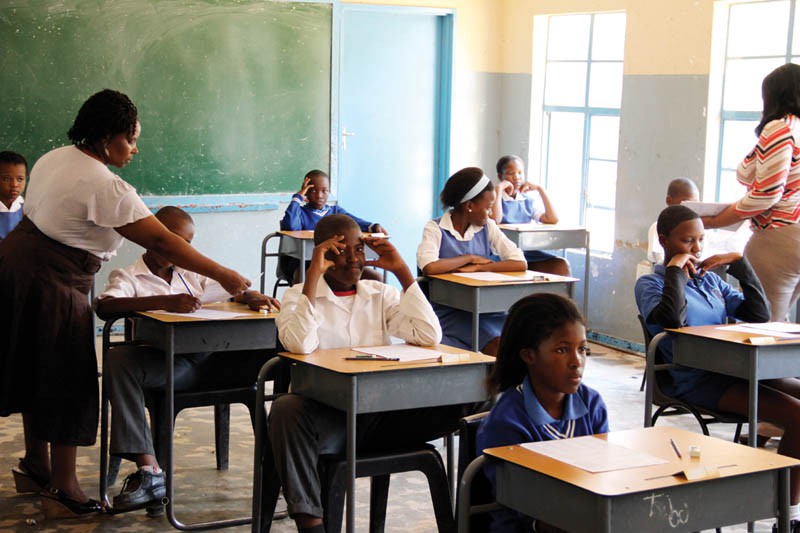 Teachers with students