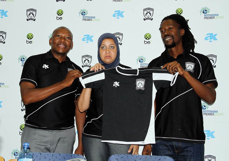 Fruitful partnership: Gunners chairman, Kitso Dlamini (left) and All Kasi managing director, Ludo Kenoeng during the signing of a new agreement in Gaborone yesterday. In the middle is Gunners CEO, Orayyah Dada. PIC: KABO MPAETONA