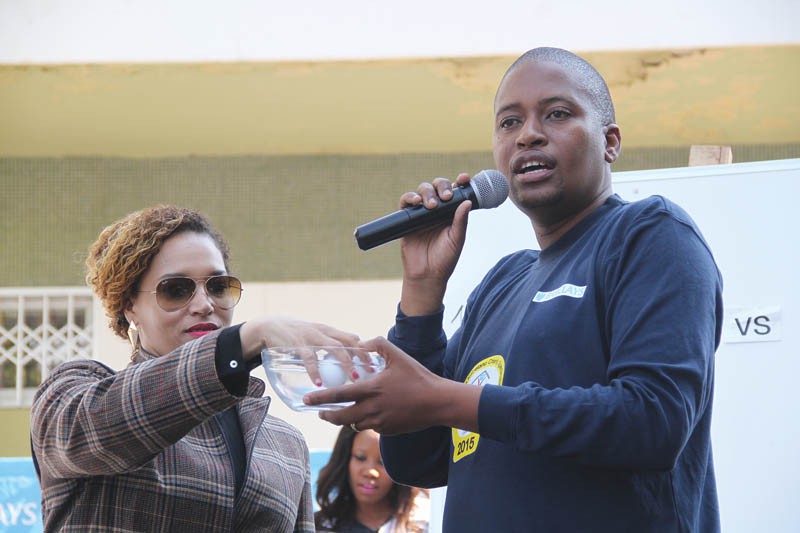 Barclays Bank of Botswana Marketing manager, Stephanie Stoneham and Losika Seboni during the Kabelano Charity Cup draw held on Friday. PIC: KENNEDY RAMOKONE