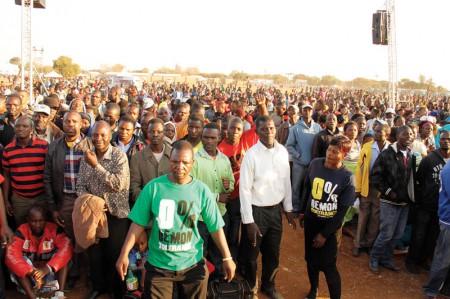 Fire: Loyal congregants await the prophet's arrival