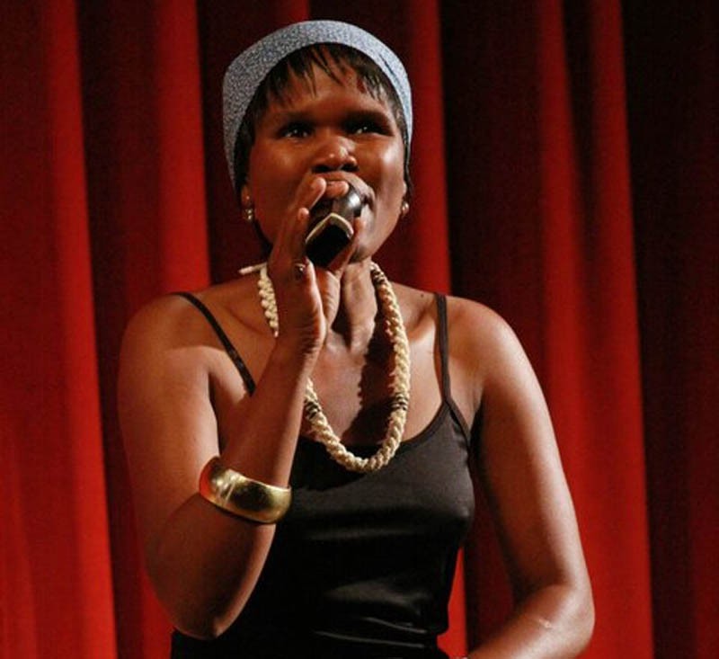 Baareng reciting one of her poems