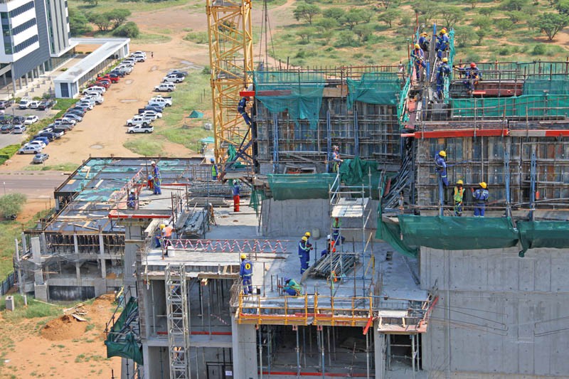 Hard workers: Despite their physically demanding job, construction workers are amongst the least paid
