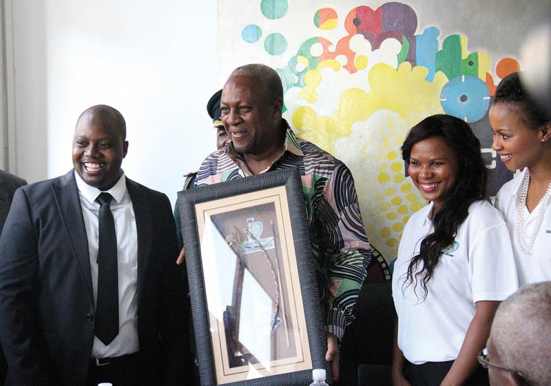 Maretlwaneng (right) sharing a light moment with Ghananian president Muhama after presenting him with a tocken of appreciation