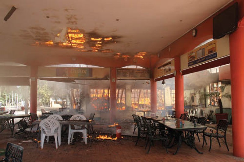 In flames: The Gaborone Golf Club club house on Sunday