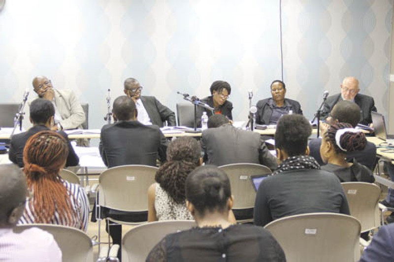 Competition Commission panel, lawyers and journalists at case hearing yesterday