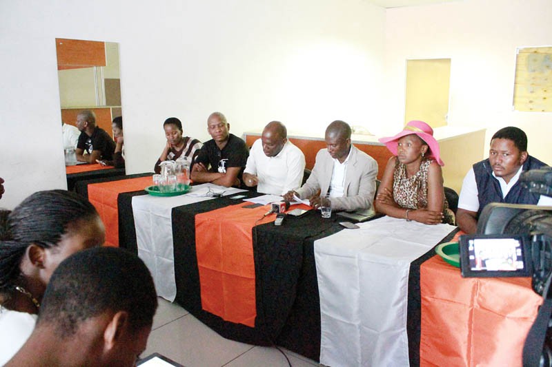 In charge: Segokgo (in formal jacket) gets to breathe another day