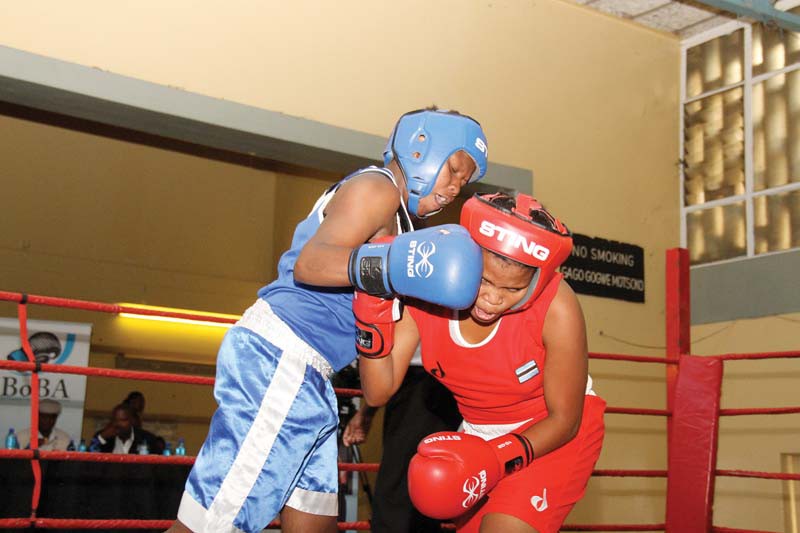 Blow by Blow: Irene Modikwa (in blue) during her fight with Orapeleng Ketshametse at the BoBA National Championships PIC: MORERI SEJAKGOMO