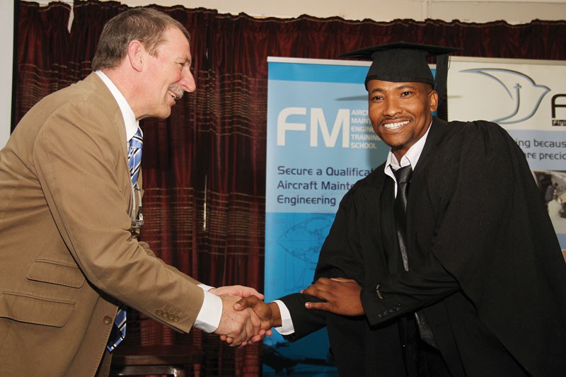 Neil Fin congradulating Thapelo Brooks PIC: KENNEDY RAMOKONE