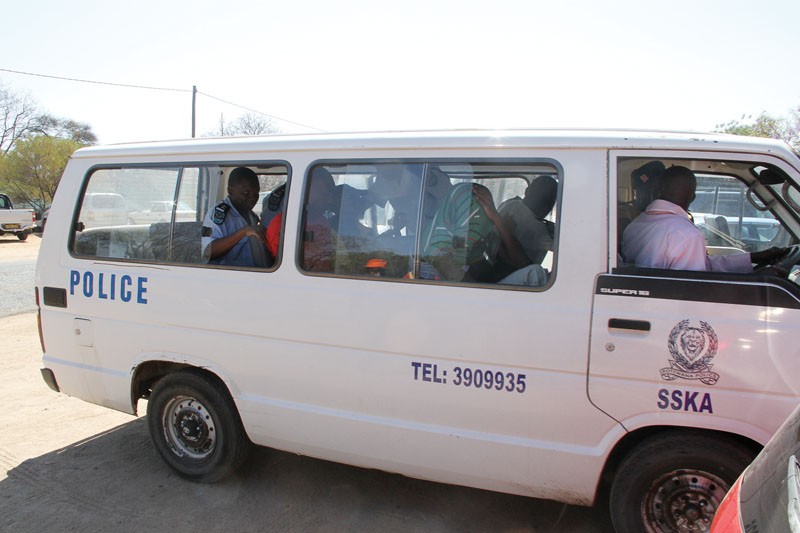On the move: A police 'combi' transporting suspects PIC: MORERI SEJAKGOMO