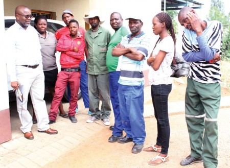 Despair: Mmegi's Gabathuse with some of the job seekers at the Francistown Labour offices. PIC: CHRISTINAH MOTLHABANE
