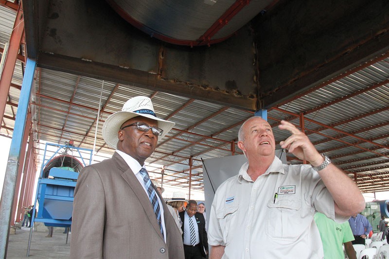 Managing Director of OFMB Michael Hallam and Minister of Agriculture Patrick Ralotsia touring the plant.PIC: MORERI SEJAKGOMO