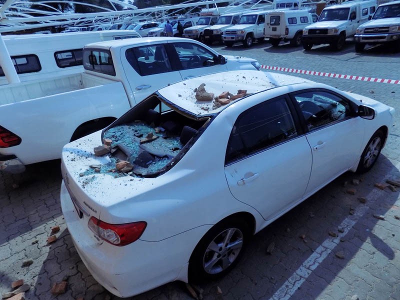 Car crushed by falling bricks