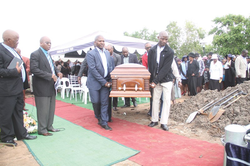 PAINFUL END: Osi- Moses' coffin carried to her final resting place at Phomolong Cemetry on Saturday PIC: KENNEDY RAMOKONE