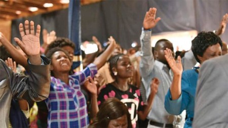 Worshipers enjoy praise during Bushiri's service