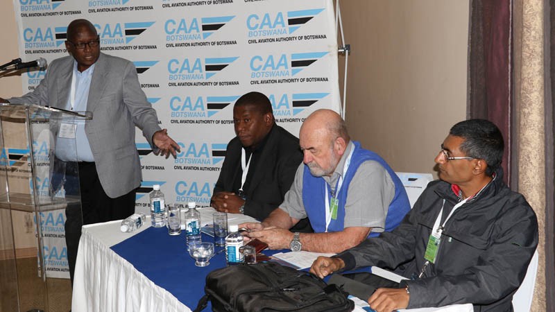 Moshabesha (standing) with CAAB board members