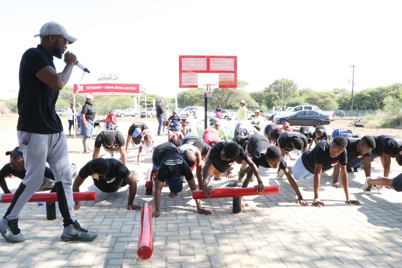 Block 8 residents exercising during the official launch of the new outdoor gym built by Time Projects